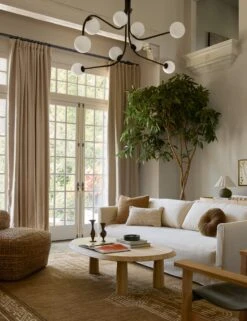 Damon Chandelier -Famous Decoration Store Lulu and Georgia LivingRoomIIIDamonchandelier Bronze Site Crop Lifestyle 2